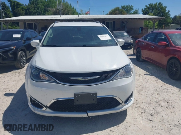 2020 Chrysler Pacifica Touring L z VIN 2C4RC1BG6LR276742, wystawiony jako IAAI lot #42167284 z przebiegiem 123 668 mil mil oraz . Historia ofert i sprzedaży dostępna na DreamBid. Obrazek 12.