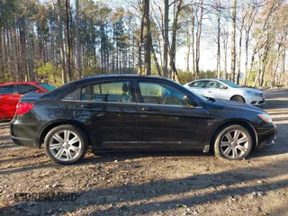 2013 Chrysler 200 LX with VIN 1C3CCBAB9DN762448, listed as a IAAI auction lot 41889859 with 130,375 mi miles. Bid and sale history available at carsss.com. Image 13.