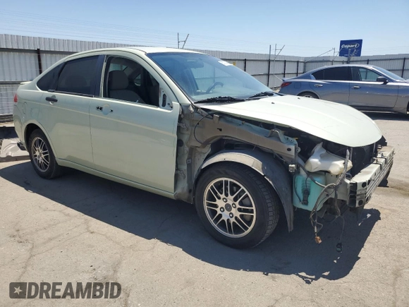 2010 Ford Focus SE with VIN 1FAHP3FN1AW227852, listed as a Copart auction lot 56392435 with 145,047 mi miles and Salvage Title. Bid and sale history available at DreamBid. Image 4.