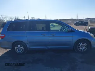 2005 Honda Odyssey EX-L with VIN 5FNRL38765B076591, listed as a IAAI auction lot 41624354 with 172,698 mi miles and . Bid and sale history available at DreamBid. Image 12.