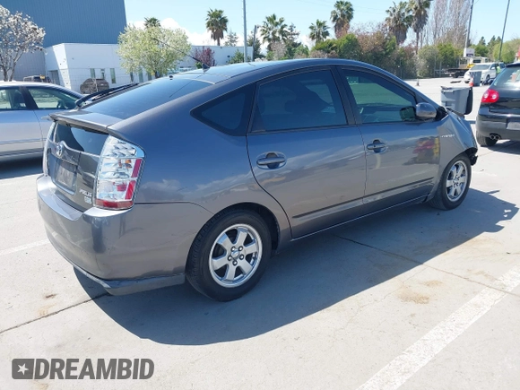2007 Toyota Prius z VIN JTDKB20U273215633, wystawiony jako IAAI lot #41955538 z przebiegiem 172 957 mil mil oraz . Historia ofert i sprzedaży dostępna na DreamBid. Obrazek 4.