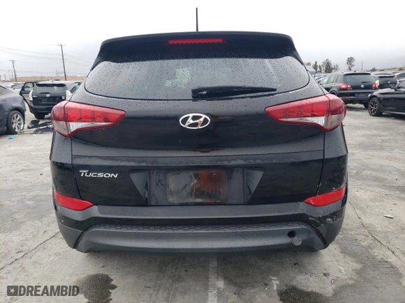 2018 Hyundai Tucson SE with VIN KM8J23A45JU698516, listed as a Copart auction lot 49079215 with 57,609 mi miles and Salvage Title. Bid and sale history available at carsss.com. Image 6.