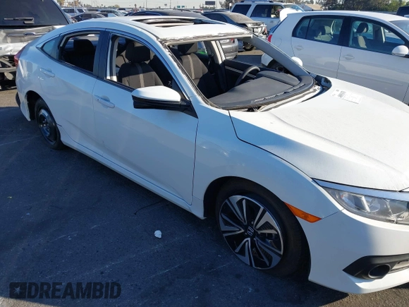 2017 Honda Civic EX-T with VIN 19XFC1E38HE002205, listed as a IAAI auction lot 40891678 with 10,398 mi miles and . Bid and sale history available at DreamBid. Image 6.