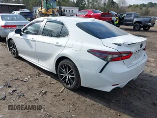 2023 Toyota Camry SE with VIN 4T1T11AK5PU756762, listed as a IAAI auction lot 41475732 with 100,534 mi miles. Bid and sale history available at carsss.com. Image 3.