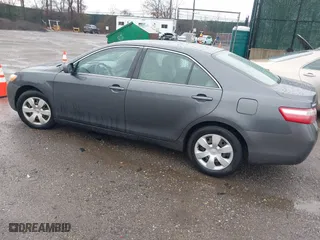 2007 Toyota Camry CE with VIN 4T1BE46K77U688152, listed as a IAAI auction lot 41799406 with 152,033 mi miles. Bid and sale history available at carsss.com. Image 3.