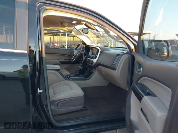 2015 GMC Canyon 2WD SLE with VIN 1GTG5BE30F1139093, listed as a IAAI auction lot 41596657 with 143,834 mi miles. Bid and sale history available at carsss.com. Image 5.