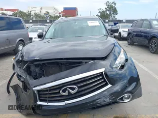 2014 Infiniti QX70 z VIN JN8CS1MW6EM410091, wystawiony jako IAAI lot #41896327 z przebiegiem 139 021 mil mil oraz . Historia ofert i sprzedaży dostępna na DreamBid. Obrazek 12.