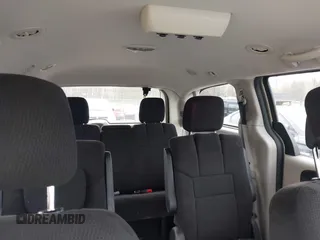 2012 Dodge Grand Caravan SE with VIN 2C4RDGBG4CR298996, listed as a IAAI auction lot 42133423 with 70,354 mi miles and . Bid and sale history available at DreamBid. Image 8.