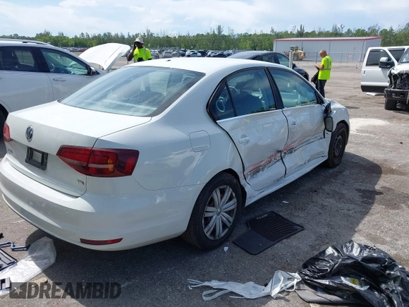 2017 Volkswagen Jetta S with VIN 3VW2B7AJXHM374687, listed as a IAAI auction lot 42596302 with 63,728 mi miles and . Bid and sale history available at DreamBid. Image 4.