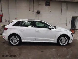 2016 Audi A3 e-tron Premium Plus with VIN WAUTPBFF2GA100666, listed as a IAAI auction lot 41315165 with 98,549 mi miles. Bid and sale history available at carsss.com. Image 14.
