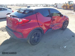 2021 Toyota C-HR LE with VIN JTNKHMBX2M1121238, listed as a IAAI auction lot 41417415 with 31,910 mi miles. Bid and sale history available at carsss.com. Image 4.