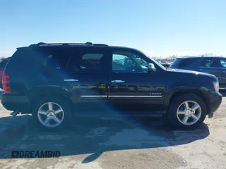 2013 Chevrolet Tahoe LTZ with VIN 1GNSKCE0XDR350970, listed as a IAAI auction lot 41704253 with 126,653 mi miles and . Bid and sale history available at DreamBid. Image 14.
