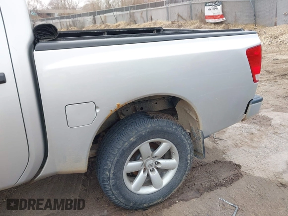 2012 Nissan Titan S with VIN 1N6AA0EJXCN310874, listed as a IAAI auction lot 42022787 with 162,317 mi miles. Bid and sale history available at carsss.com. Image 6.