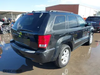 2010 Jeep Grand Cherokee Laredo with VIN 1J4PS4GK9AC101152, listed as a IAAI auction lot 41706626 with 182,265 mi miles. Bid and sale history available at carsss.com. Image 4.