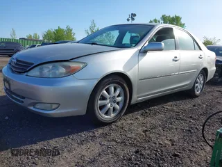 2003 Toyota Camry LE with VIN 4T1BE30K43U227357, listed as a IAAI auction lot 42144237 with 101,135 mi miles and . Bid and sale history available at DreamBid. Image 2.