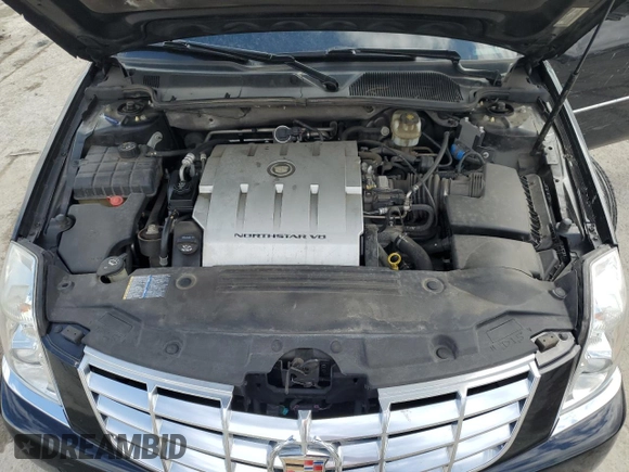 2008 Cadillac DTS 1SD z VIN 1G6KD57Y68U203116, wystawiony jako Copart lot #50050045 z przebiegiem 81 777 mil mil oraz Szkoda całkowita • Salvage title. Historia ofert i sprzedaży dostępna na DreamBid. Obrazek 13.