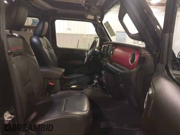 2021 Jeep Wrangler Unlimited Rubicon with VIN 1C4HJXFN2MW719135, listed as a IAAI auction lot 41835698 with 20,447 mi miles and . Bid and sale history available at DreamBid. Image 5.