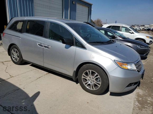 2012 Honda Odyssey EX-L with VIN 5FNRL5H64CB039166, listed as a Copart auction lot 48688315 with 133,341 mi miles and Salvage Title. Bid and sale history available at carsss.com. Image 4.