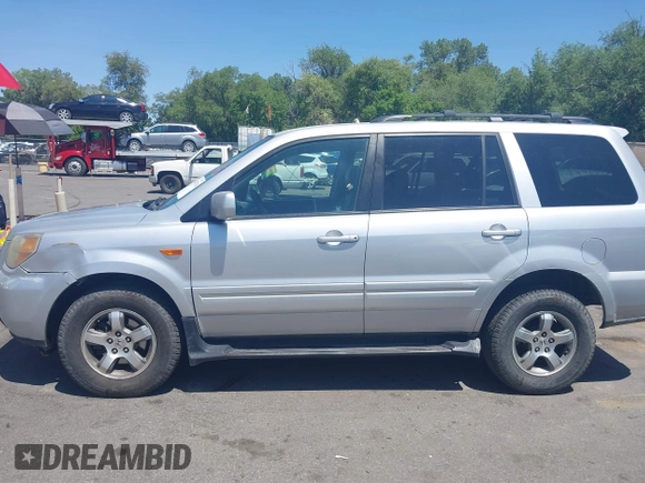 2007 Honda Pilot EX-L с VIN 2HKYF18667H516800, выставлен на аукционе IAAI как лот 42403766 с пробегом 254 600 миль миль и . История ставок и продаж доступна на DreamBid. Изображение 14.