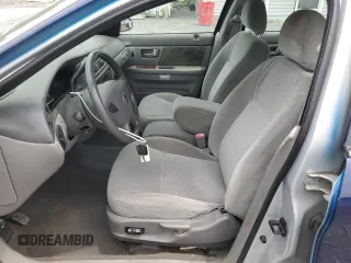 2003 Mercury Sable GS z VIN 1MEFM50U83G602556, wystawiony jako Copart lot #61019515 z przebiegiem 94 998 mil mil oraz Czysty tytuł • Clean title. Historia ofert i sprzedaży dostępna na DreamBid. Obrazek 7.