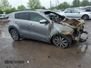 2018 Kia Sportage EX z VIN KNDPN3AC6J7364541, wystawiony jako Copart lot #56382695 z przebiegiem Nie podano mil oraz Szkoda całkowita • Salvage title. Historia ofert i sprzedaży dostępna na DreamBid. Obrazek 4.