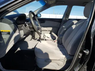 2008 Kia Optima LX with VIN KNAGE123X85200778, listed as a Copart auction lot 54308855 with 191,960 mi miles and Salvage Title. Bid and sale history available at carsss.com. Image 7.