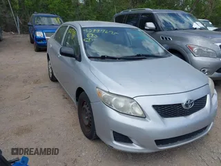 2009 Toyota Corolla with VIN JTDBL40E099041319, listed as a IAAI auction lot 42119698 with 205,666 mi miles. Bid and sale history available at carsss.com. Image 1.