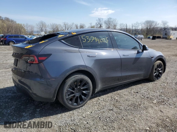 2021 Tesla Model Y Long Range with VIN 5YJYGDEE9MF119974, listed as a Copart auction lot 53794025 with 66,411 mi miles and Salvage Title. Bid and sale history available at DreamBid. Image 3.