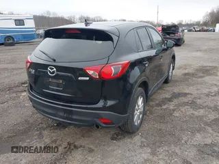 2016 Mazda CX-5 Touring with VIN JM3KE4CY4G0738713, listed as a IAAI auction lot 41998597 with 146,595 mi miles and . Bid and sale history available at carsss.com. Image 4.