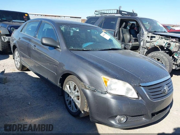 2008 Toyota Avalon XL z VIN 4T1BK36B48U318961, wystawiony jako IAAI lot #39317874 z przebiegiem 334 707 mil mil oraz . Historia ofert i sprzedaży dostępna na DreamBid. Obrazek 1.