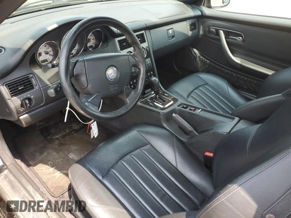 2002 Mercedes-Benz SLK с VIN WDBKK66F32F238778, выставлен на аукционе Copart как лот 58210895 с пробегом 93 879 миль миль и Списание • Salvage title. История ставок и продаж доступна на DreamBid. Изображение 8.