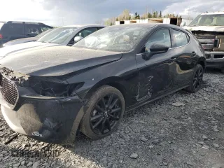 2024 Mazda 3 GT with VIN JM1BPBMY1R1715456, listed as a Copart auction lot 56871555 with 19,790 mi miles and Salvage title. Bid and sale history available at DreamBid. Image 1.