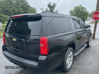 2015 Chevrolet Suburban LT z VIN 1GNSKJKC9FR696000, wystawiony jako Copart lot #59152535 z przebiegiem 146 457 mil mil oraz Czysty tytuł • Clean title. Historia ofert i sprzedaży dostępna na DreamBid. Obrazek 4.