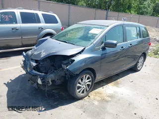 2012 Mazda 5 Sport with VIN JM1CW2BL1C0116150, listed as a IAAI auction lot 42571812 with 124,236 mi miles and . Bid and sale history available at DreamBid. Image 18.
