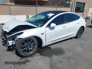 2020 Tesla Model 3 Standard Range Plus with VIN 5YJ3E1EAXLF590591, listed as a IAAI auction lot 42140338 with 79,342 mi miles and . Bid and sale history available at DreamBid. Image 20.