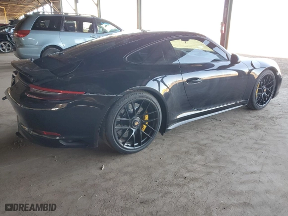2019 Porsche 911 Carrera S with VIN WP0AB2A96KS114597, listed as a Copart auction lot 57873704 with 44,417 mi miles and Salvage Title. Bid and sale history available at carsss.com. Image 3.