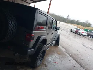 2020 Jeep Wrangler Unlimited Sport S z VIN 1C4HJXDG1LW103364, wystawiony jako IAAI lot #41541954 z przebiegiem 57 735 mil mil oraz . Historia ofert i sprzedaży dostępna na DreamBid. Obrazek 4.