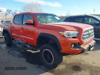 2016 Toyota Tacoma SR with VIN 3TMCZ5AN6GM032601, listed as a IAAI auction lot 41408996 with 76,467 mi miles. Bid and sale history available at carsss.com. Image 1.