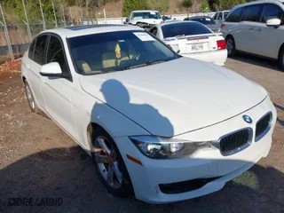 2015 BMW 3 Series 328i with VIN WBA3A5G50FNS85686, listed as a IAAI auction lot 41966698 with 105,737 mi miles. Bid and sale history available at carsss.com. Image 1.
