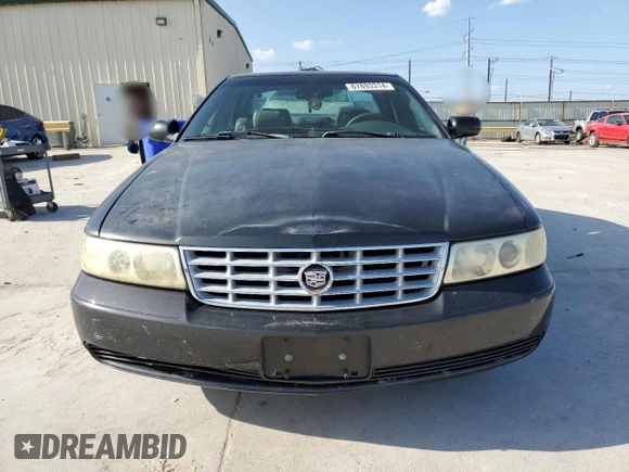 2002 Cadillac Seville Luxury SLS z VIN 1G6KS54YX2U154438, wystawiony jako Copart lot #67893314 z przebiegiem 115 313 mil mil oraz Szkody całkowita. Historia ofert i sprzedaży dostępna na DreamBid. Obrazek 5.