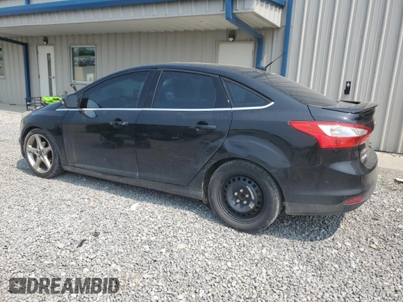 2014 Ford Focus Titanium with VIN 1FADP3J20EL347435, listed as a Copart auction lot 54947345 with 144,169 mi miles and Salvage title. Bid and sale history available at DreamBid. Image 2.