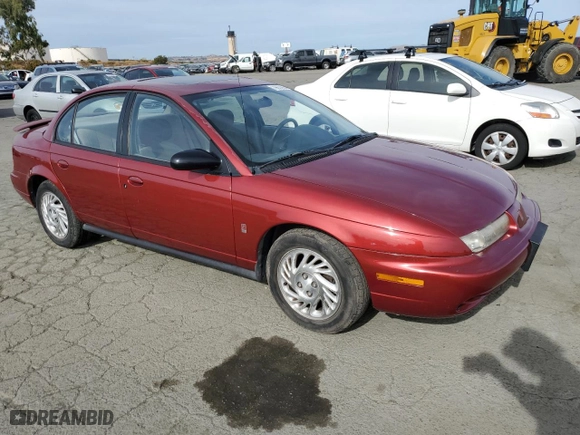 1999 Saturn SL with VIN 1G8ZK5276XZ333618, listed as a Copart auction lot 79633954 with 114,320 mi miles and Salvage Title. Bid and sale history available at carsss.com. Image 4.