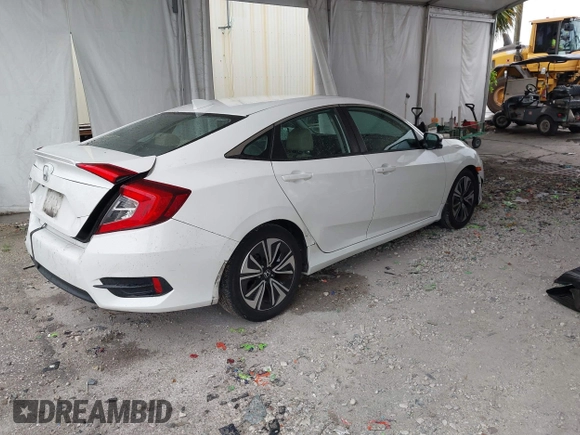 2017 Honda Civic EX-L z VIN 19XFC1F78HE025582, wystawiony jako IAAI lot #42432134 z przebiegiem 144 688 mil mil oraz . Historia ofert i sprzedaży dostępna na DreamBid. Obrazek 4.
