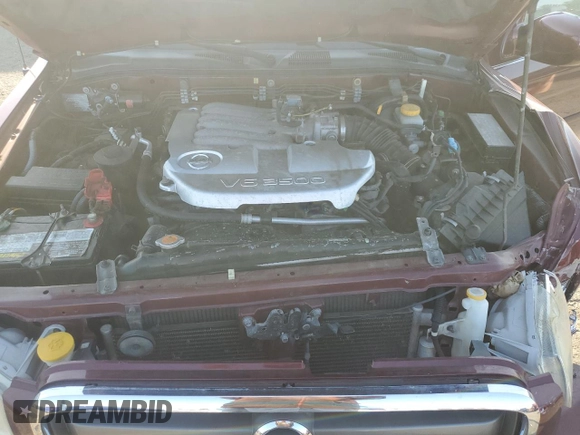 2003 Nissan Pathfinder LE with VIN JN8DR09Y83W831073, listed as a Copart auction lot 62382265 with 94,596 mi miles and Salvage title. Bid and sale history available at DreamBid. Image 12.