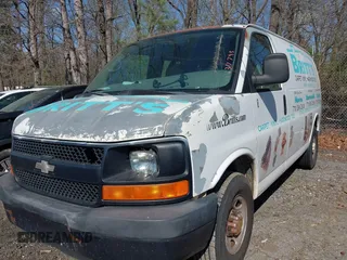 2009 Chevrolet Express Cargo Van with VIN 1GCGG25C291137795, listed as a IAAI auction lot 41886119 with 386,764 mi miles. Bid and sale history available at carsss.com. Image 2.