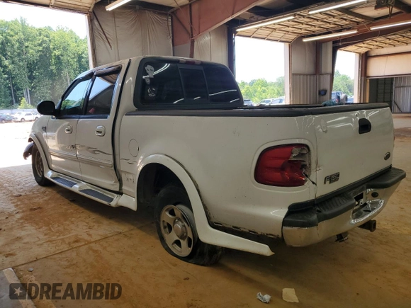 2001 Ford F-150 XLT with VIN 1FTRW07W51KE03221, listed as a Copart auction lot 63628855 with 237,510 mi miles and Salvage title. Bid and sale history available at DreamBid. Image 2.