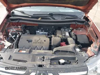 2014 Mitsubishi Outlander SE z VIN JA4AZ3A31EZ008884, wystawiony jako IAAI lot #41825440 z przebiegiem 171 232 mil mil oraz . Historia ofert i sprzedaży dostępna na DreamBid. Obrazek 10.