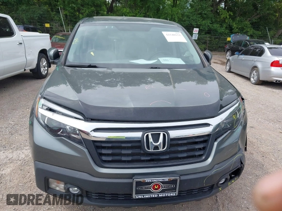 2018 Honda Ridgeline RTL-T with VIN 5FPYK3F61JB013733, listed as a IAAI auction lot 42548122 with 92,407 mi miles and . Bid and sale history available at DreamBid. Image 17.