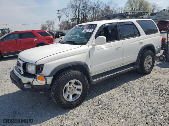 2000 Toyota 4Runner SR5 with VIN JT3HN86R5Y0286565, listed as a Copart auction lot 49271215 with 230,509 mi miles and Salvage Title. Bid and sale history available at carsss.com. Image 1.