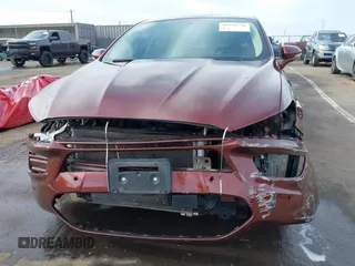 2015 Ford Fusion SE Hybrid with VIN 3FA6P0LU8FR172313, listed as a IAAI auction lot 41556556 with 152,567 mi miles. Bid and sale history available at carsss.com. Image 6.
